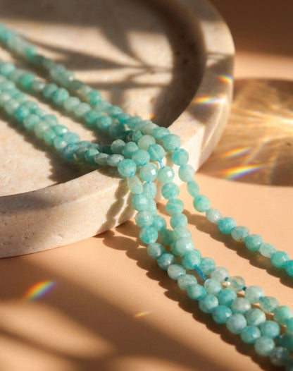 Fil de perles palets facettées Amazonite · 4 mm